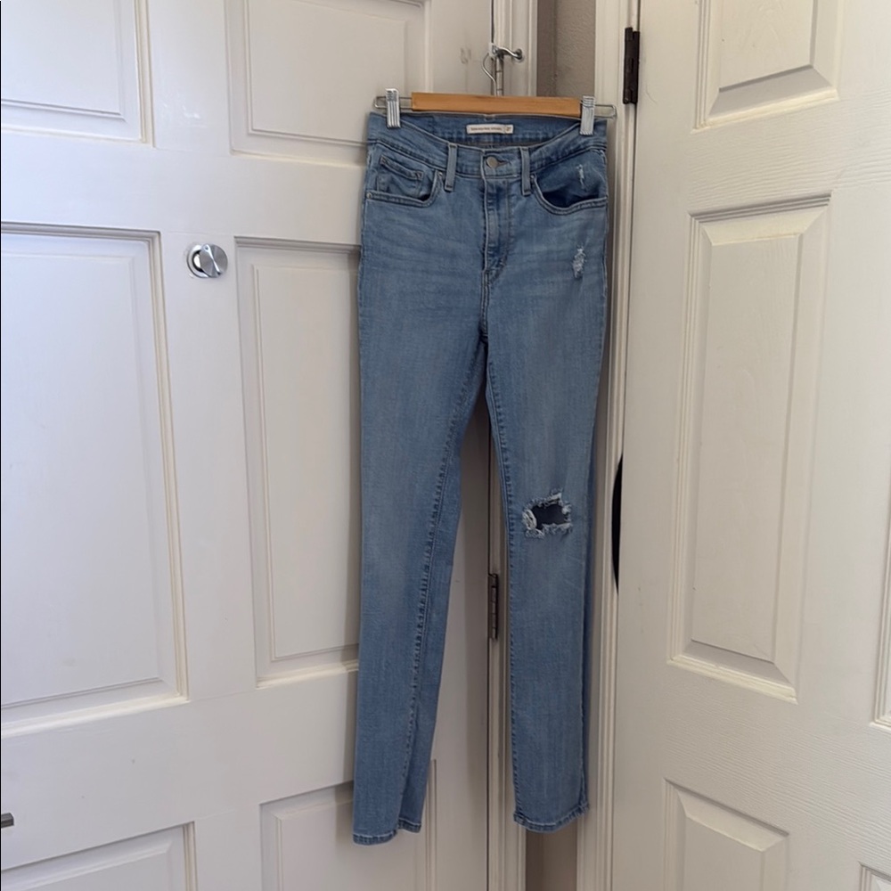 Women's Light Blue Distressed Jeans